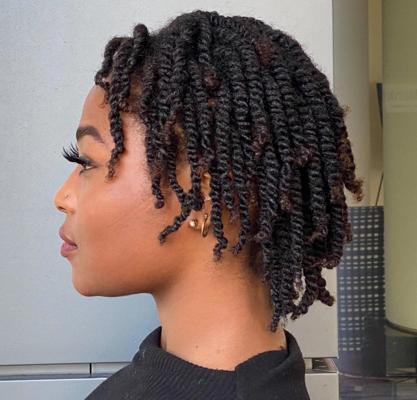 Short two-strand twists on natural hair, shown in side profile